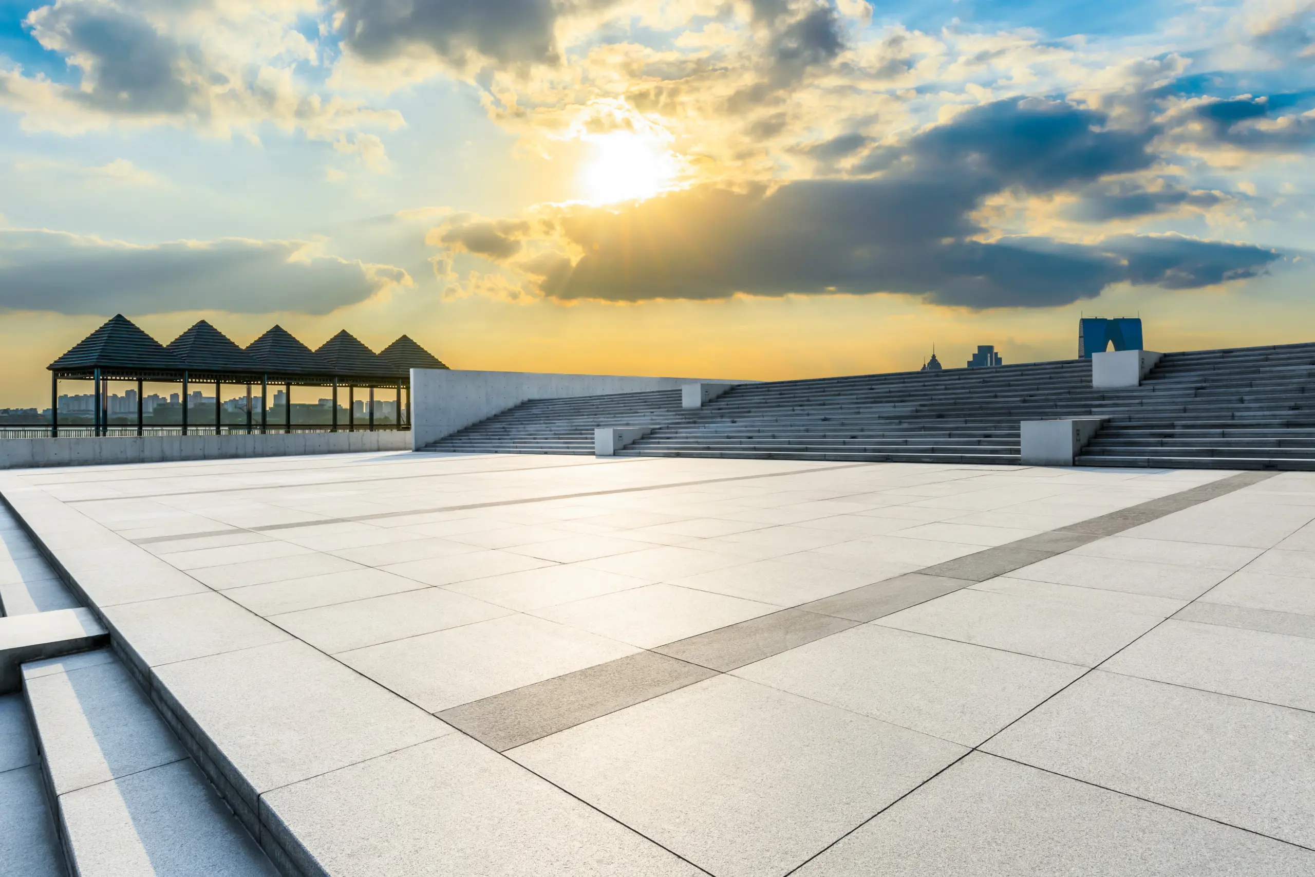 empty square floor and sky clouds at sunset