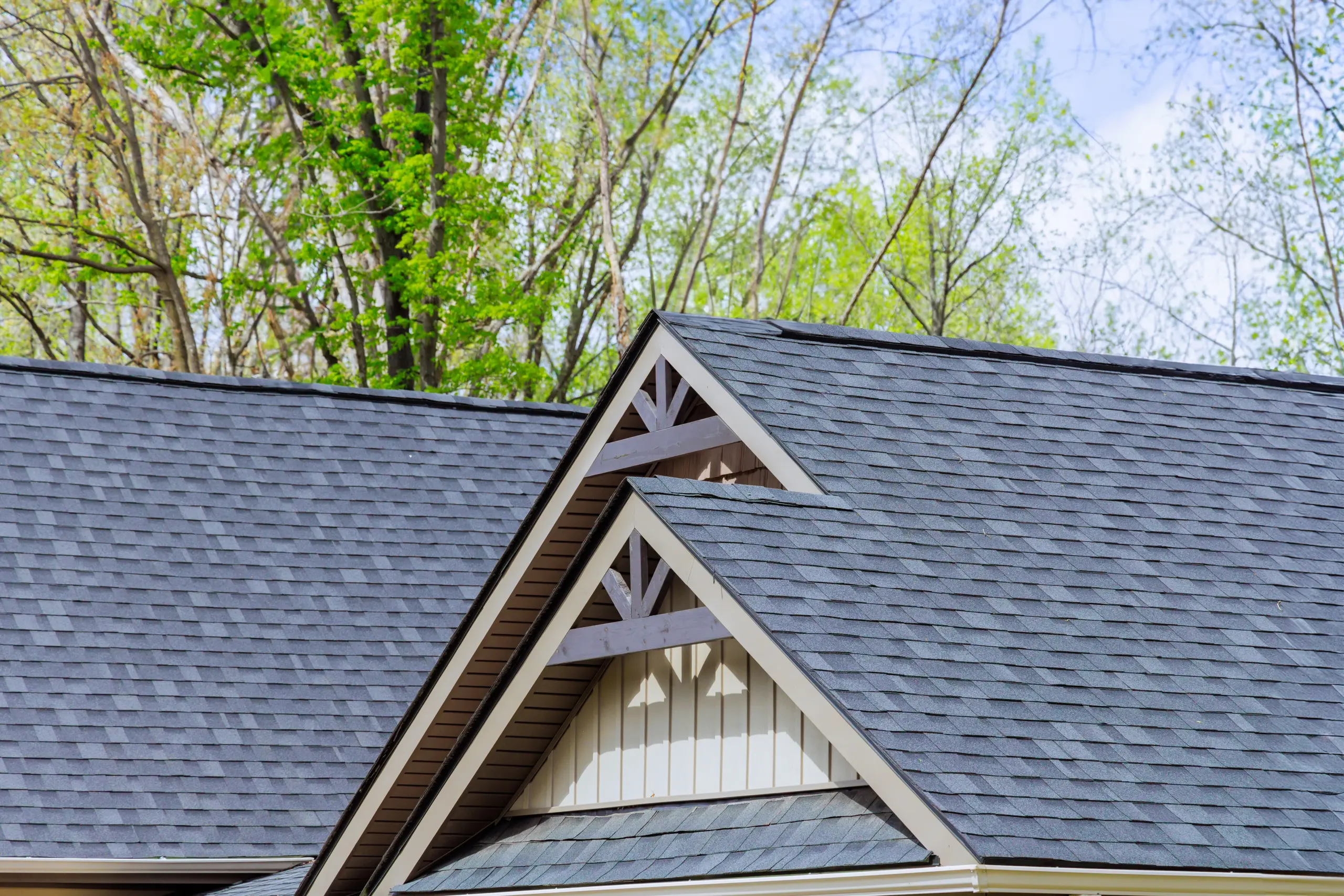 new asphalt shingles on a suburban home roof